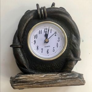 Small decorative horseshoe clock